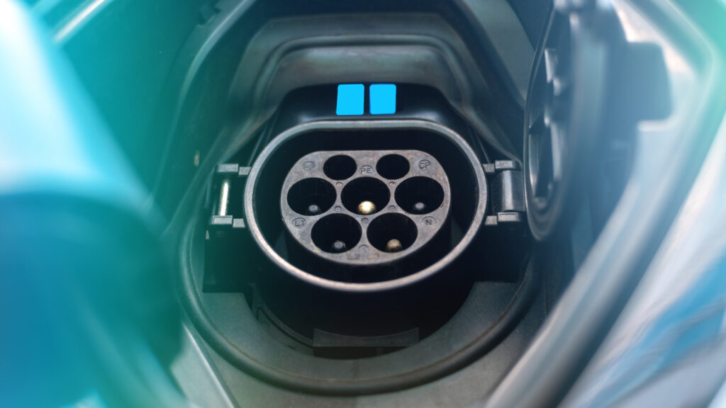 Charging socket of an electric car with blue light