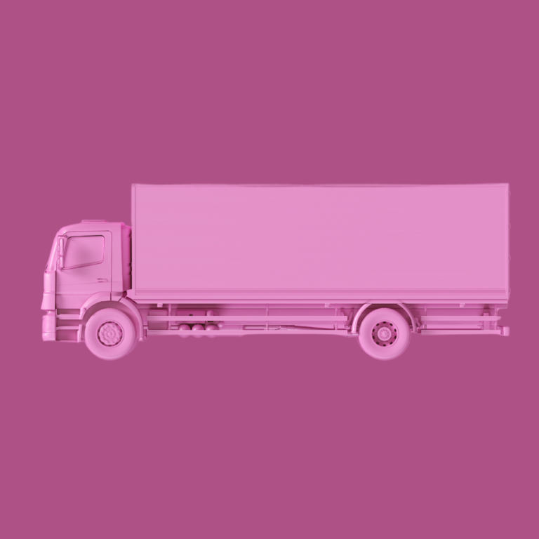 En la imagen se obersva un camión de color rosa